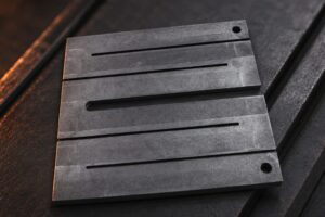 Graphite heating elements designed for uniform heat generation in high-temperature vacuum furnace applications.
